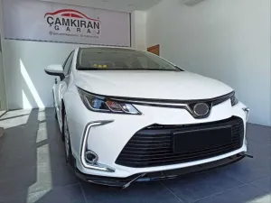Toyota Corolla 2018-Günümüz (E210) uyumlu 2019+ Ön Lıp modelleri DRS Tuning'de. Kaliteli malzeme, hızlı kargo ve güvenli alışverişle hemen inceleyin.