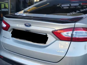 Ford Mondeo 2014-2022 (Mk5) uyumlu Spoiler -2016 Boyalı modelleri Oto Aksesuar Shop'de. Kaliteli malzeme, hızlı kargo ve güvenli alışverişle hemen inceleyin.
